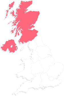 A map of UK split into regions highlighting Scotland and Ireland in red.